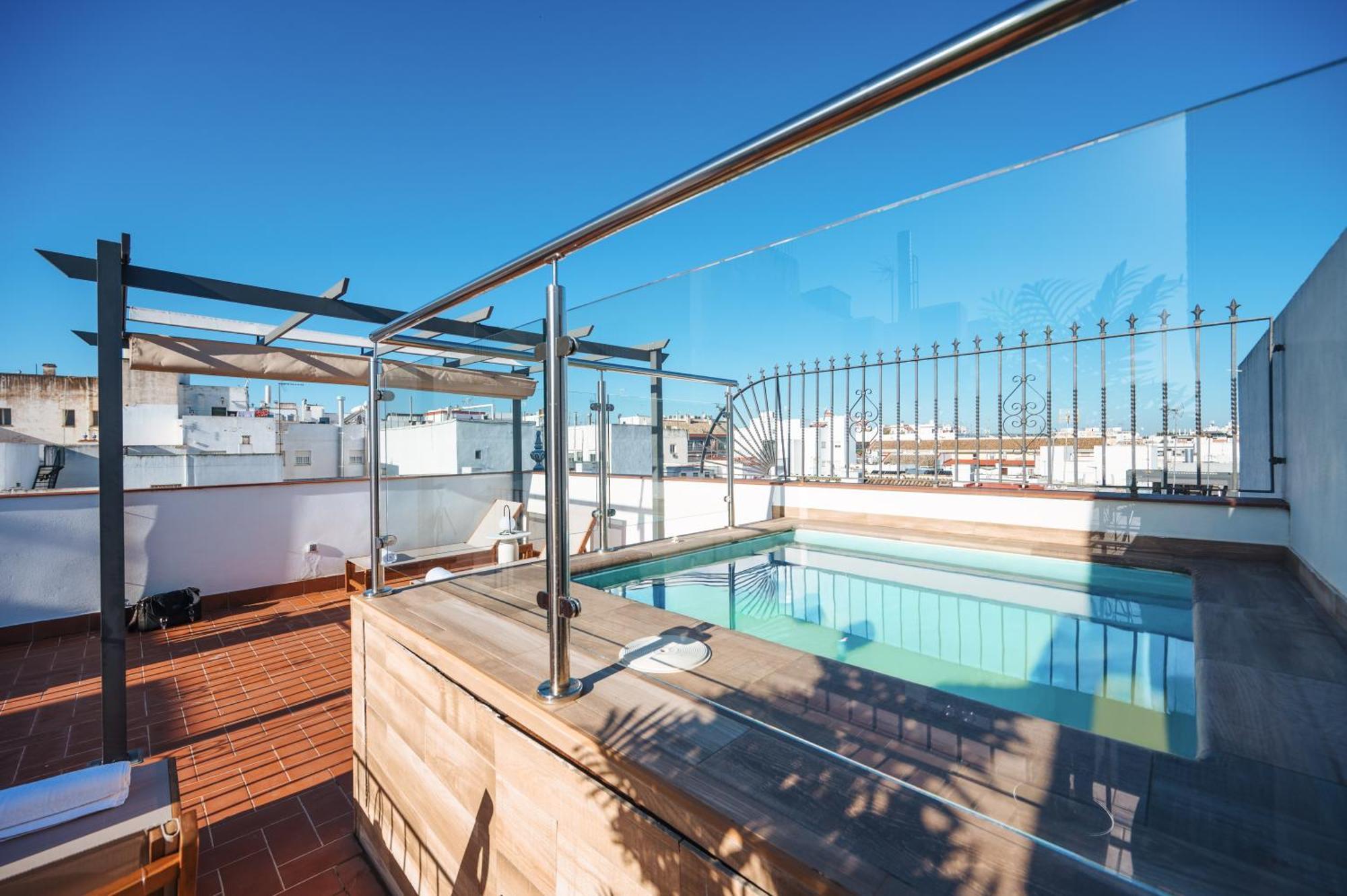 Apartamentos "El Escondite De Triana" Севилья Экстерьер фото